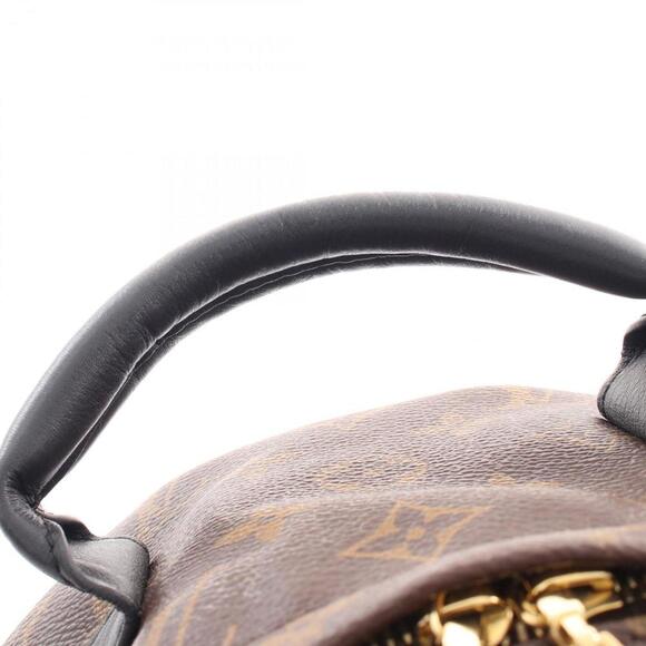 LOUIS VUITTON Brown Monogram Leather Backpack - Picture 10 of 11